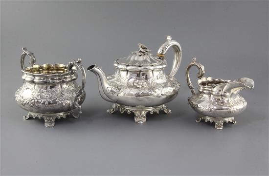 A William IV silver three piece tea set by Joseph & John Angell, gross 41.5 oz.